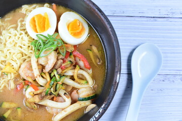 Japanese ramen, miro-based soup, sirloin steak, vegetables, pasta, and egg