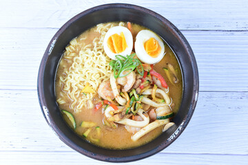 Japanese ramen, miro-based soup, sirloin steak, vegetables, pasta, and egg