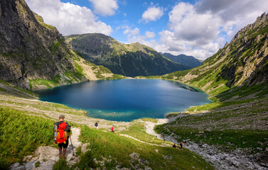 Hiking on Czarny Staw lake in Tatra mountains, Poland