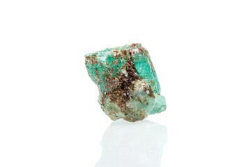 macro mineral stone emerald on a white background