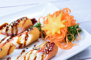 traditional Japanese food appetizer, with soy sauce, sesame seeds, vegetables