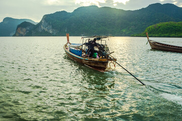 Fototapeta na wymiar landscape sky with Small Fishing Boats in Thailand