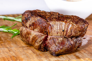 Marbled beef minion steak fried properly so that the middle is pink.