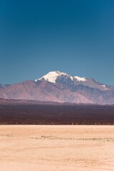 Snowy peak in the Andes Mountains, taken from natural reserve El Leoncito, located in the province of San Juan, Argentina.