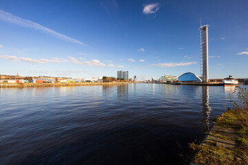 The post industrial, old ship building docks on the river Clyde on a clear spring morning 