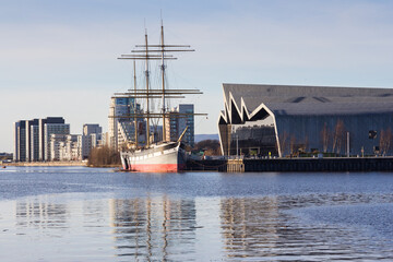 A panoramic view of the Transport Museum and Tall Ship on the river Clyde in Glasgow on a sunny...