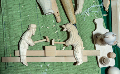 Wooden toy are made in the old Russian technique of woodcarving