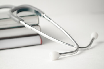 Beautiful stethoscope on book. Medical concept