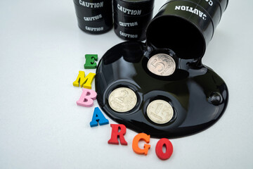 barrels of oil spilled near the Russian flag in order to reflect sanctions against Russia.