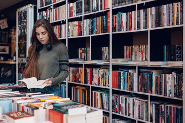 Woman buying books at a bookstore