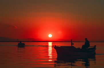 fishing boat at sunset