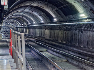 Empty dark subway tunnel - 494583010