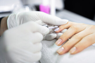 Obraz na płótnie Canvas Manicure treatment in a beauty salon