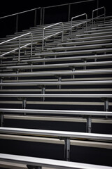 Bleachers of hight school stadium made out of metal benches