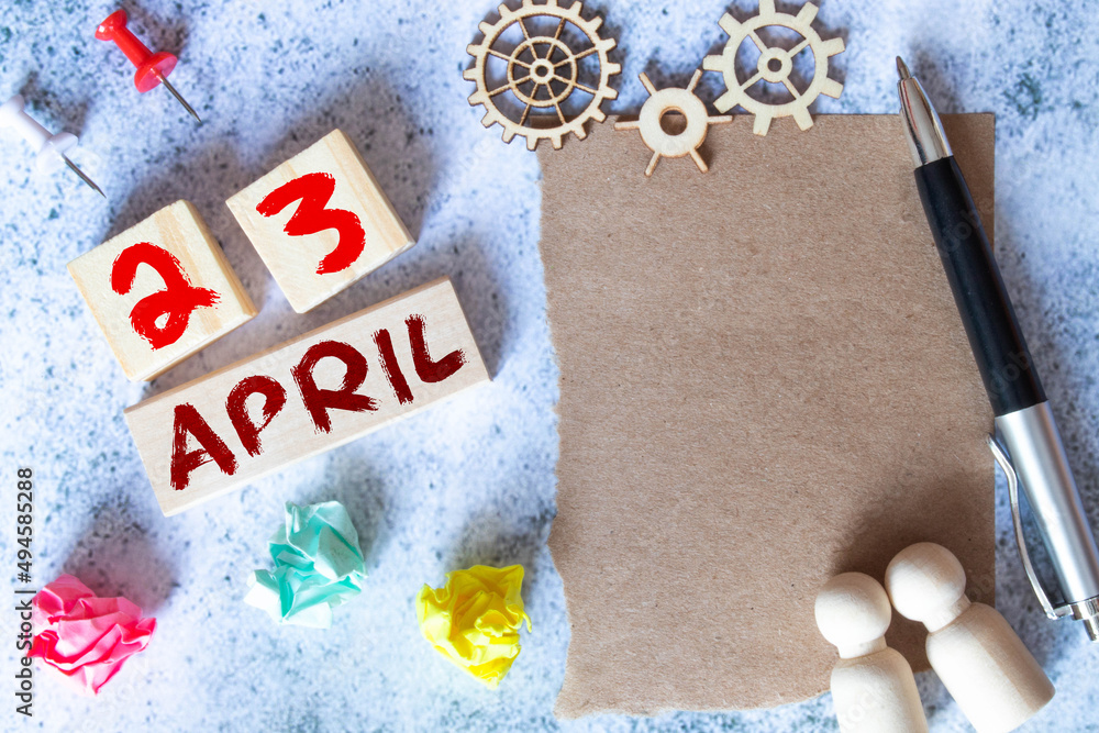 Poster april 23 - from wooden blocks with letters, important date concept, white background random letters 