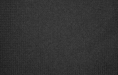 Fototapeta na wymiar The texture of nylon black fabric.Synthetic black nylon fabric. The background is nylon black.