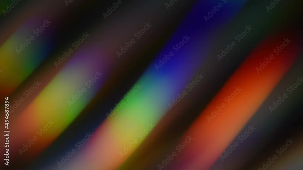Wall mural blurred rainbow lines and bokeh motion. moving and fading multi-color gradient lines on a dark backg
