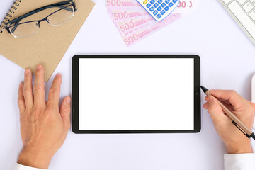 Blank tablet screen while typing on a keyboard, as well as a screen mockup for further customization, can be used for a variety of purposes. area for copying