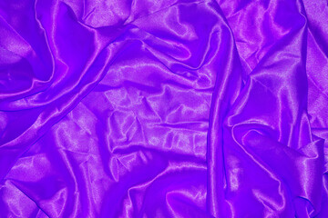 purple cloth background abstract with soft waves.      