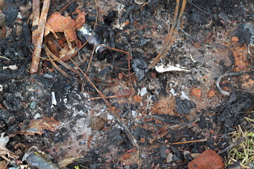 the rest of the burning garbage full of rusty iron