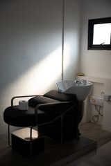 woman client person having a process to making treatment a hair with hairdresser in beauty salon