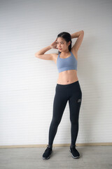 Fototapeta premium young Asian woman measure body proportions, health fitness to slim body concept