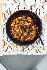 vegan couscous with butter beans topped with sundried tomatoes and Moroccan spices, healthy plant-based food