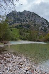 River in Picos de Europa national park on a cloudy day, Spain