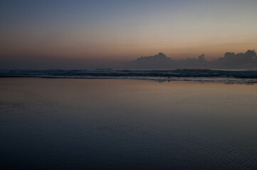Obraz premium beautiful dawn at sea with clouds in Arroio do Sal ,brazil 