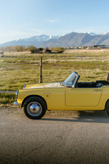 Yellow Japanese Classic Convertible Sports Car