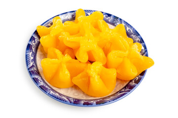 Pinched Golden Egg Yolks or Thong Yip, traditional Thai Sweets made from egg yolks, flour and sugar syrup served on a dish isolated on white background. Clipping path