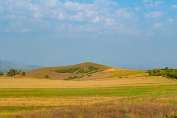 Fototapeta premium picturesque fields and mountains in georgia in summer