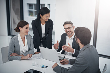 We should move forward with this. Shot of a group of businesspeople meeting in the boardroom.