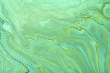 Abstract fluid art background light green and cyan colors. Liquid marble. Acrylic painting with emerald gradient