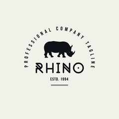 Handdrawn Rhino Logo design vector template safari animal badge, label.