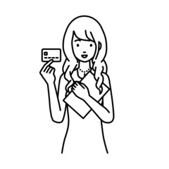 立って書類とカードを手に持つドレスの女性