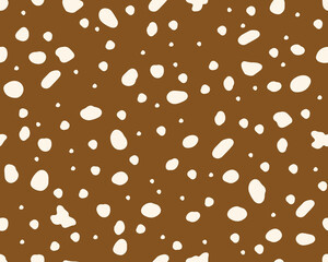  Deer skin texture seamless pattern. Perfect use for fabric, wallpaper, home decor. Abstract spots. Vector background on brown surface