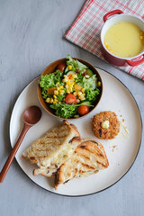 Delicious homemade meal. Cheese Toast with Salad Bowl and Potato Korokke.  Great for breakfast and tea break