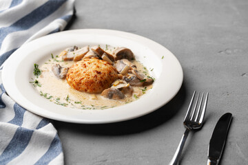 Delicious veal cutlet with melted mozzarella cheese on white plate