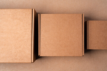 Cardboard box on beige background in studio
