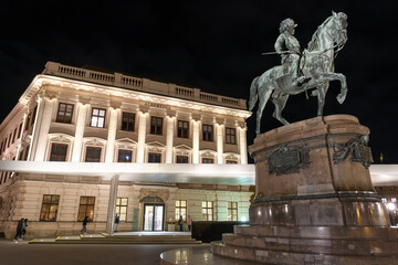 Obraz premium Evening view to Erzherzog Albrecht equestrian monument near famous Albertina museum palace in Vienna, Austria