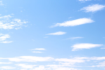 Fototapeta premium Cloudy on bright blue vast sky with light wind with summer natural background