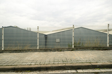 metal facade of a storage building in an industrial landscape