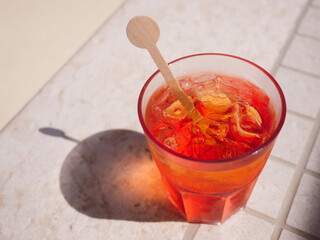 Beautiful glass with a refresh cocktail, standing on the bar. Top view, close-up. Vacation and travel concept. Moments of celebration