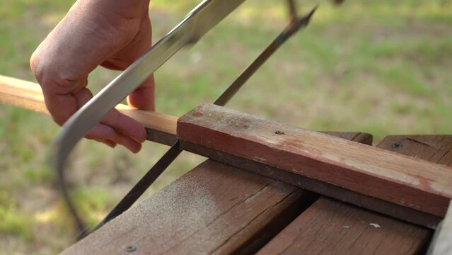 Metal Saw Used In Manual Cutting Of Wood Material. Carpentry Concept. close up