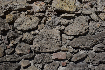 Steinmauer in Grau als HIntergrund 