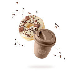 Brown beige to go cup hot coffee with chocolate donut with sprinkles flying isolated on white background.