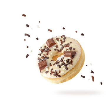 White Chocolate Glazed Donut With Dark Crumbs And Creme Filled Closeup Flying. Sweet Doughnut With Sprinkles Falling Isolated On White