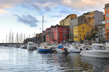 Fototapeta na wymiar colorful buildings and boats in the port of Bastia in Corsica