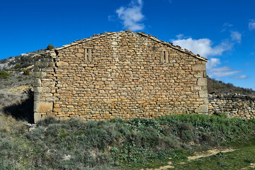stone wall of abandoned and ruined rural house